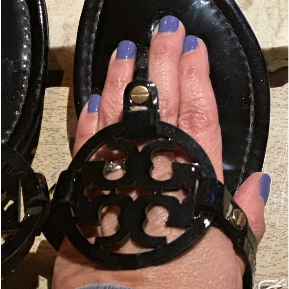 Tory Burch sandals. Black are authentic, white not too sure.  Selling as a set.